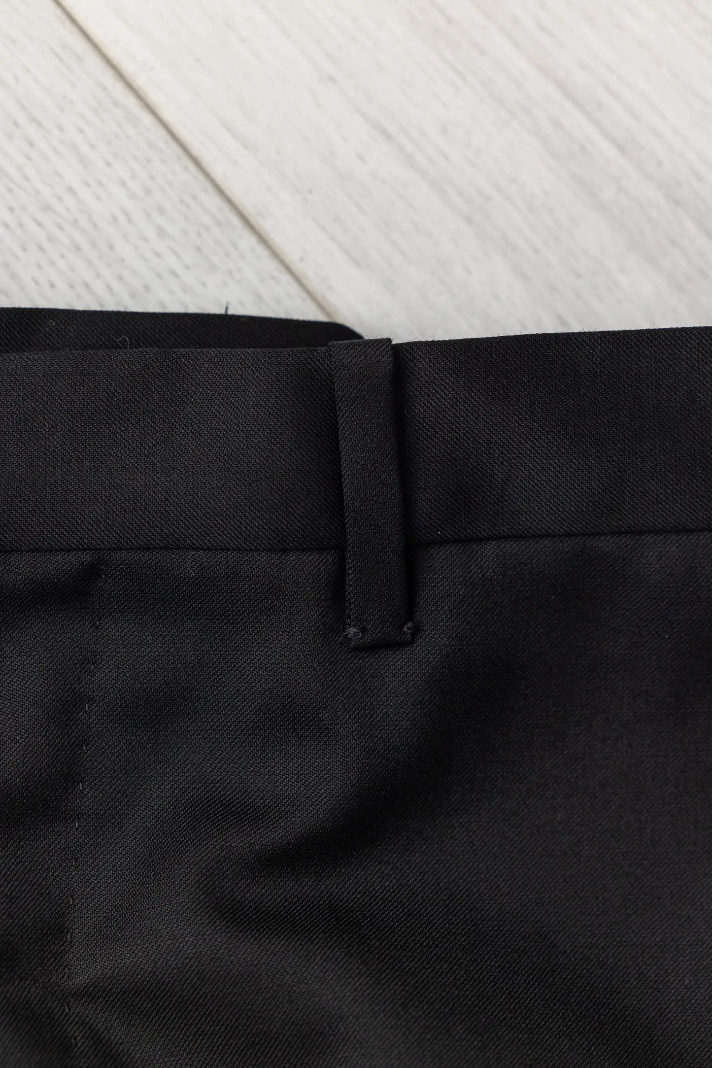 Four seasons black wool trousers